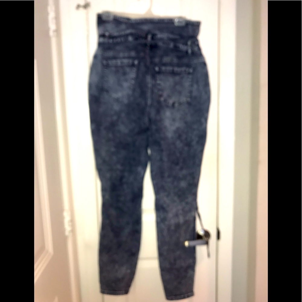 High waisted stone wash jeans with belt